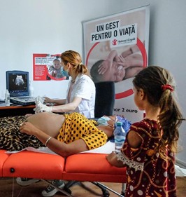 A pregnant mother receiving care at a prenatal visit with Save the Children